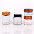 hot sell 1oz 3oz 4oz wide mouth clear glass child resistant jar with wooden transfered printed plastic screw lid